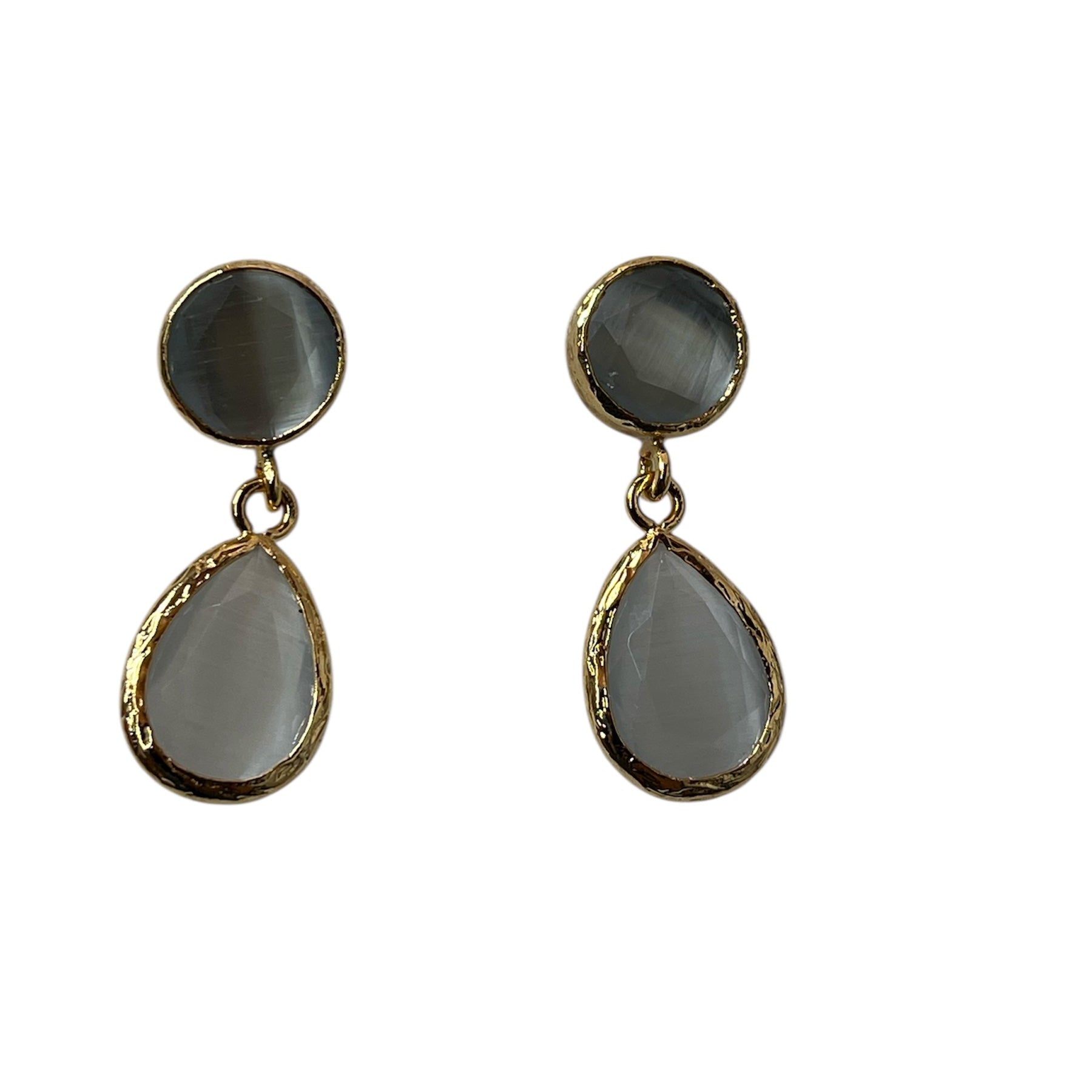 Cats eye tear drop shape dangles on a circle post in ice white.